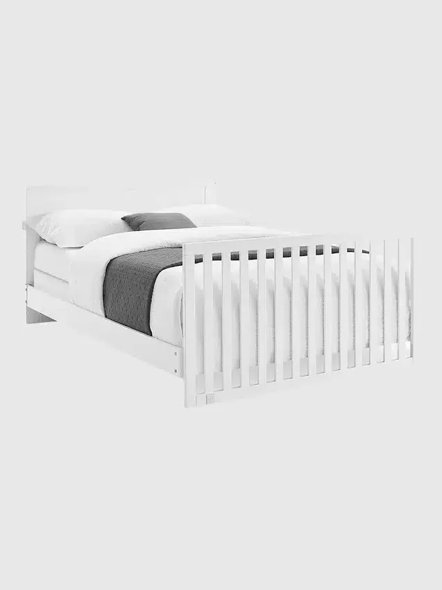 Barandillas de babyGap para convertir la cuna en cama