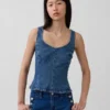 Blusa ajustada de denim con peplum