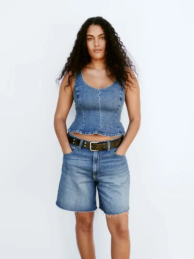 Blusa ajustada de denim con peplum