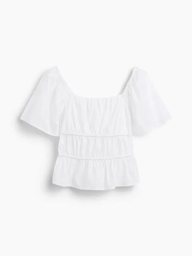 Blusa con peplum y cuello cuadrado