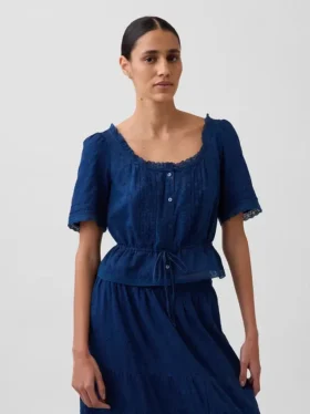 Blusa con peplum y ribete de encaje