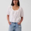 Blusa corta con pinzas y mangas hasta el codo