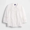 Blusa holgada con cierre de botones y ribete de encaje
