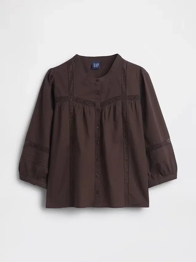 Blusa holgada con cierre de botones y ribete de encaje