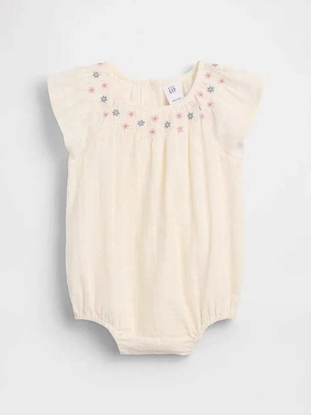 Body floral fruncido para bebé