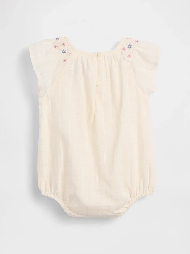 Body floral fruncido para bebé