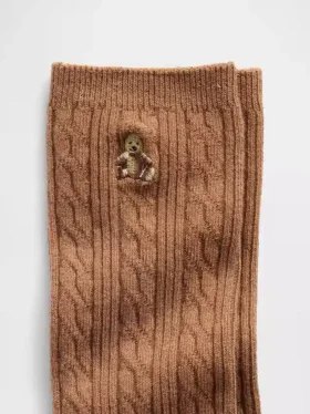 Calcetines de caña con punto trenzado y el oso Brannan