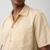 Camisa de algodón dobby con corte holgado y bajo recto