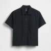 Camisa utilitaria de corte holgado y bajo recto