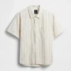 Camisas de corte holgado con rayas de seersucker y bajo redondeado