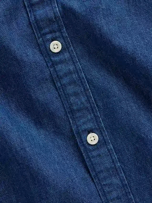 Camisas vaqueras de corte holgado y bajo recto