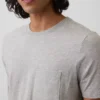 Camiseta con bolsillo de algodón orgánico para adulto