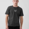 Camiseta de peso grueso con logo y corte holgado