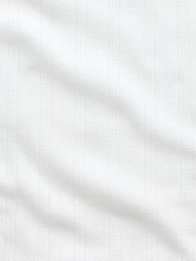 Camiseta de pijama con punto calado y dobladillo ondulado