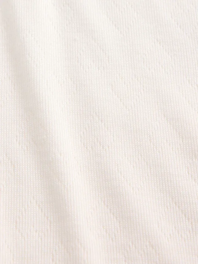 Camiseta de pijama infantil de punto calado reciclado