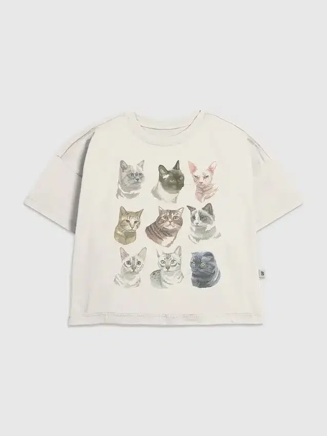 Camiseta infantil con estampado de caras de gato