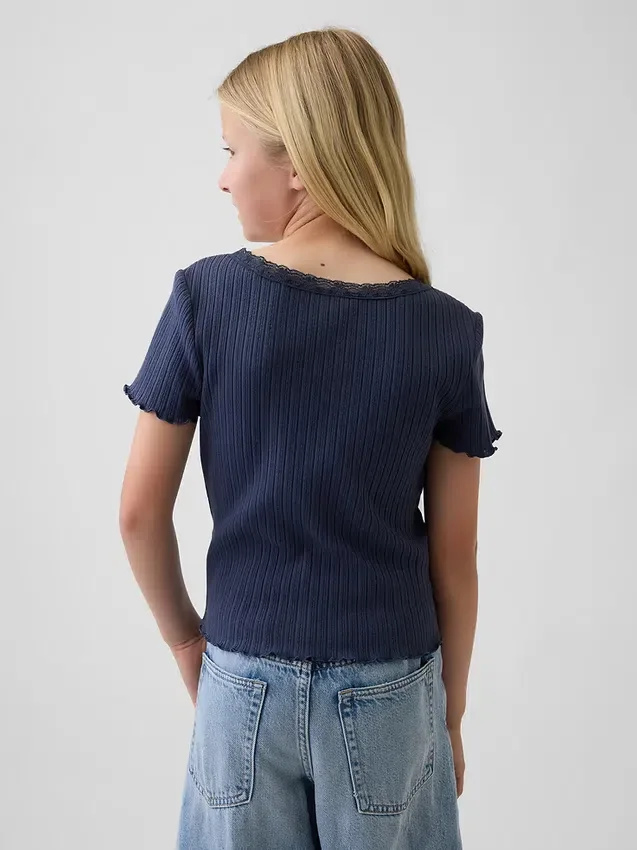 Camiseta infantil de punto calado acanalado con botones en la parte delantera