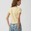Camiseta infantil de punto calado acanalado con botones en la parte delantera