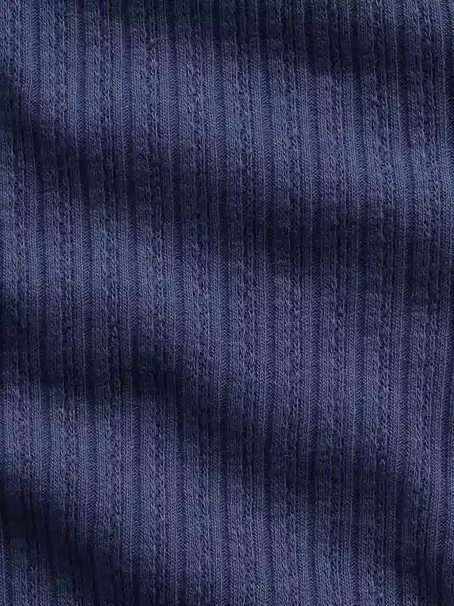 Camiseta infantil de punto calado acanalado con botones en la parte delantera