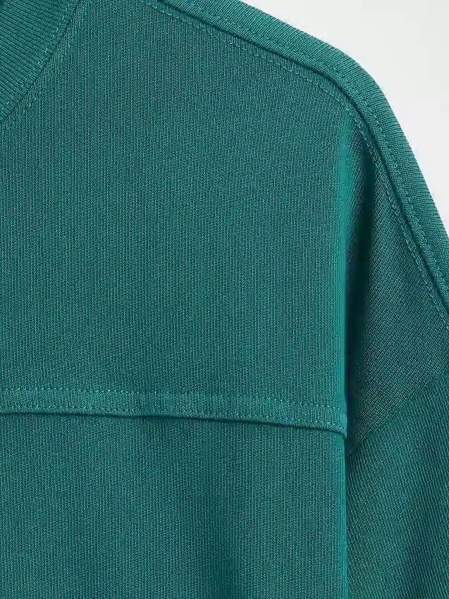 Camiseta infantil de punto grueso con costuras