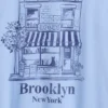 Camiseta infantil holgada con estampado gráfico