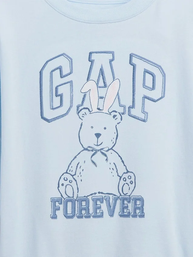 Camiseta infantil oversize con logotipo gráfico