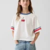 Camiseta infantil oversize de corte cuadrado con estampado gráfico