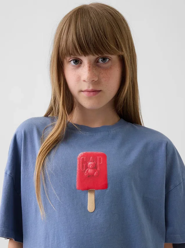 Camiseta infantil oversize de corte cuadrado con estampado gráfico