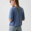 Camiseta infantil oversize de corte cuadrado con estampado gráfico