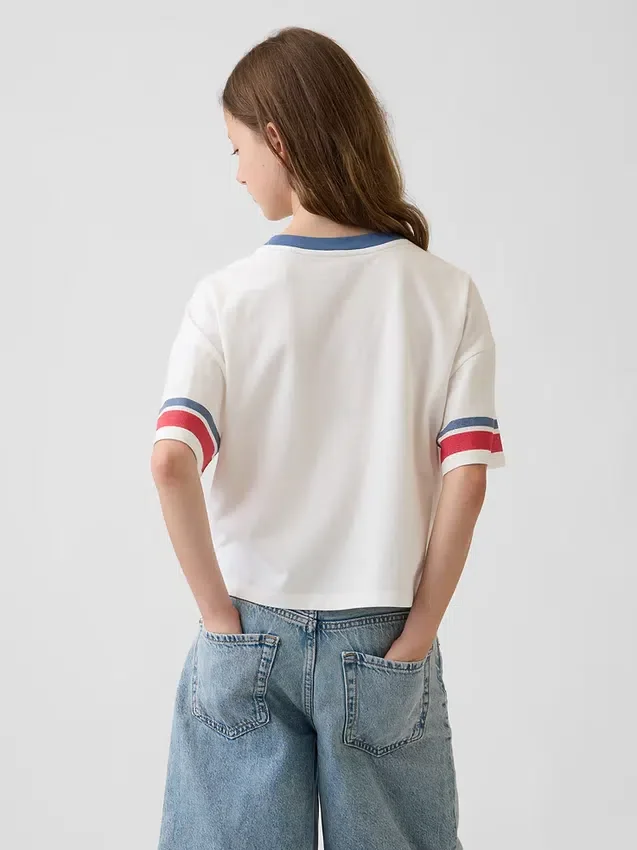 Camiseta infantil oversize de corte cuadrado con estampado gráfico