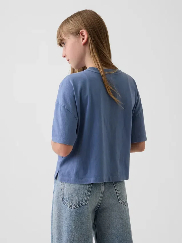 Camiseta infantil oversize de corte cuadrado con estampado gráfico