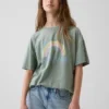 Camiseta infantil oversize tipo túnica con estampado