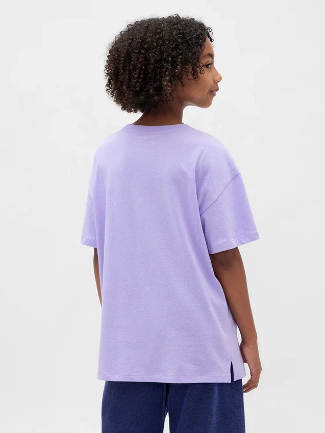 Camiseta infantil oversize tipo túnica con estampado