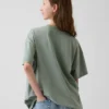 Camiseta infantil oversize tipo túnica con estampado