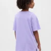 Camiseta infantil oversize tipo túnica con estampado