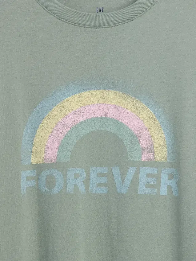 Camiseta infantil oversize tipo túnica con estampado