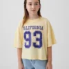 Camiseta oversize de corte cuadrado con logotipos de estados para niños