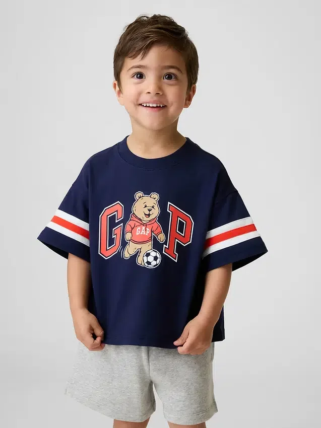 Camiseta oversize para bebés y niños con logotipo gráfico de Brannan Bear Varsity