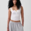 Camiseta sin mangas de pijama tipo Henley con encaje de canalé fino