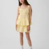 Camiseta sin mangas infantil con volantes y ojales