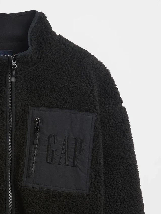Chaqueta con cremallera oversize de sherpa reciclado y logotipo