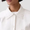 Chaqueta tipo camisa holgada con dobladillo de ojales