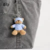 Colgante para bolso «Brannan Bear» con saco de dormir