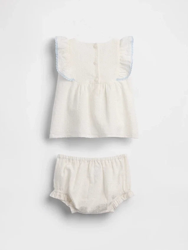 Conjunto de babero con ojales para bebé