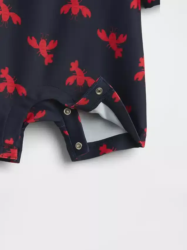 Conjunto de baño con camiseta protectora para bebé