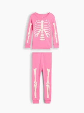 Conjunto de pijama de algodón orgánico cepillado para bebés y niños con estampado de esqueleto que brilla en la oscuridad