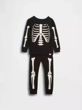 Conjunto de pijama de algodón orgánico cepillado para niños y bebés con estampado de esqueleto que brilla en la oscuridad