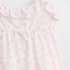 Conjunto de pijama infantil reciclado con camiseta de tirantes con volantes y pantalones cortos