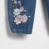 Conjunto de vaqueros con estampado floral para bebé