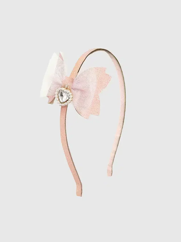Diadema con lazo brillante y colgante de corazón de Sweet Wink
